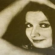 El texto musical E SE DOMANI de MINA también está presente en el álbum Mina (1964)