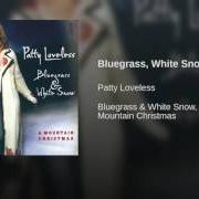 El texto musical SILENT NIGHT de PATTY LOVELESS también está presente en el álbum Bluegrass & white snow (2002)
