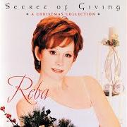 El texto musical THIS CHRISTMAS de REBA MCENTIRE también está presente en el álbum Secret of giving (2002)