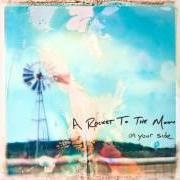 El texto musical ON YOUR SIDE de A ROCKET TO THE MOON también está presente en el álbum On your side (2009)