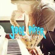 El texto musical GOLDMINE de JOEL PIPER también está presente en el álbum Dying to live (2012)