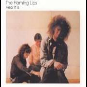 El texto musical TRAINS, BRAINS & RAIN de THE FLAMING LIPS también está presente en el álbum Hear it is (1986)
