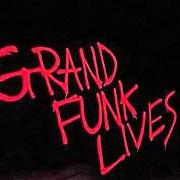 El texto musical GREED OF MAN de GRAND FUNK RAILROAD también está presente en el álbum Grand funk lives (1981)