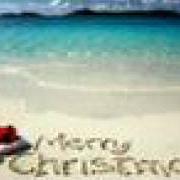 El texto musical CHRISTMAS IN DIXIE de KENNY CHESNEY también está presente en el álbum All i want for christmas is a real good tan (2003)