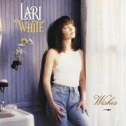 El texto musical WHEN IT RAINS de LARI WHITE también está presente en el álbum Wishes (1994)