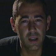 El texto musical FERITE de LUCA CARBONI también está presente en el álbum Carovana (1998)