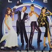 El texto musical MOVE de MANHATTAN TRANSFER también está presente en el álbum Live (1987)