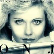 El texto musical LIFT ME UP de OLIVIA NEWTON-JOHN también está presente en el álbum 2 (2002)