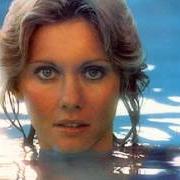 El texto musical DON'T THROW IT ALL AWAY de OLIVIA NEWTON-JOHN también está presente en el álbum Come on over (1976)