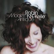 El texto musical COMES LOVE de ROBIN MCKELLE también está presente en el álbum Modern antique (2008)