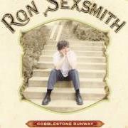 El texto musical UP THE ROAD de RON SEXSMITH también está presente en el álbum Cobblestone runway (2002)