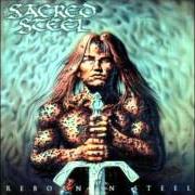 El texto musical IN THE MOUTH OF MADNESS de SACRED STEEL también está presente en el álbum Reborn in steel (1997)