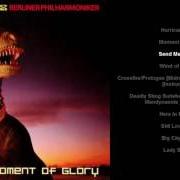 El texto musical HERE IN MY HEART de SCORPIONS también está presente en el álbum Moment of glory (2000)