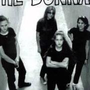 El texto musical LET'S GO MANO de THE DONNAS también está presente en el álbum The donnas