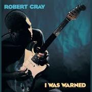 El texto musical HE DON'T LIVE HERE ANYMORE de THE ROBERT CRAY BAND también está presente en el álbum I was warned (1992)