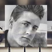 El texto musical AM I BLUE de EDDIE COCHRAN también está presente en el álbum Piano