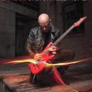 El texto musical JUMPIN' OUT de JOE SATRIANI también está presente en el álbum Unstoppable momentum (2013)