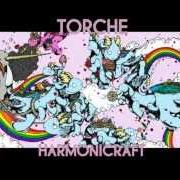 El texto musical LETTING GO de TORCHE también está presente en el álbum Harmonicraft (2012)
