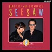 El texto musical CLOSE TO MY FIRE de BETH HART & JOE BONAMASSA también está presente en el álbum Seesaw (2013)