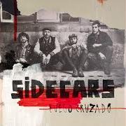 El texto musical FUEGO CRUZADO de SIDECARS también está presente en el álbum Fuego cruzado (2014)