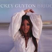 El texto musical BLACK LIKE ME de MICKEY GUYTON también está presente en el álbum Bridges (2020)
