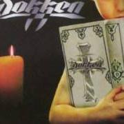 El texto musical CHANGE THE WORLD de DOKKEN también está presente en el álbum Erase the slate (1999)