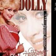 El texto musical WAYFARING STRANGER de DOLLY PARTON también está presente en el álbum Heartsongs: live from home (1994)