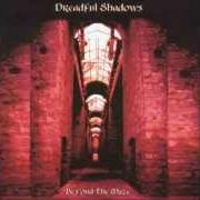 El texto musical BURNING THE SHROUDS de DREADFUL SHADOWS también está presente en el álbum Burning the shrouds (1997)