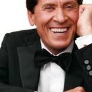 El texto musical IL MIO AMICO de GIANNI MORANDI también está presente en el álbum L'amore ci cambia la vita (2002)